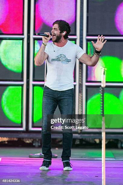 Thomas Rhett performs on day 3 of the Faster Horses Festival at Michigan International Speedway on July 19, 2015 in Brooklyn, Michigan.