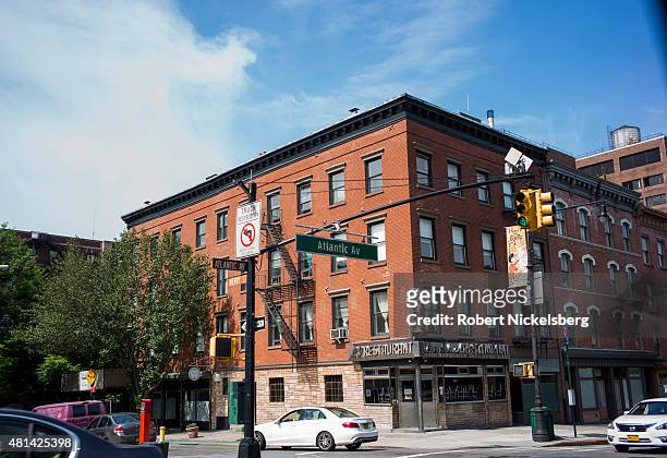 Automobile traffic moves along Atlantic Avenue next to the Long Island College Hospital campus June 19, 2015 in the Brooklyn borough of New York. The...