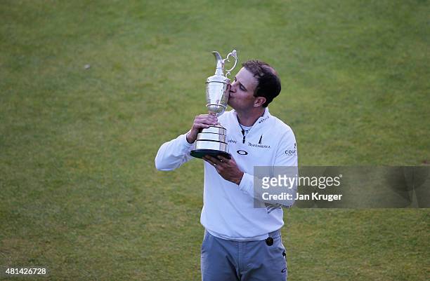 Zach Johnson of the United States kisses the Claret Jug after winning the 144th Open Championship at The Old Course during a 4-hole playoff on July...