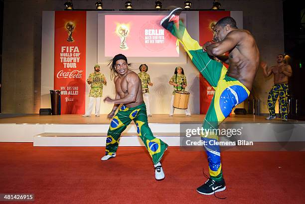 Dancers of Tangara Brasil Dance perform at the Gala Night of the FIFA World Cup Trophy Tour on March 29, 2014 in Berlin, Germany.