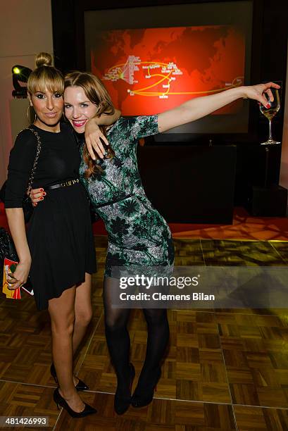 Senna Gammour , and Julia Dietze pose at the Gala Night of the FIFA World Cup Trophy Tour on March 29, 2014 in Berlin, Germany.