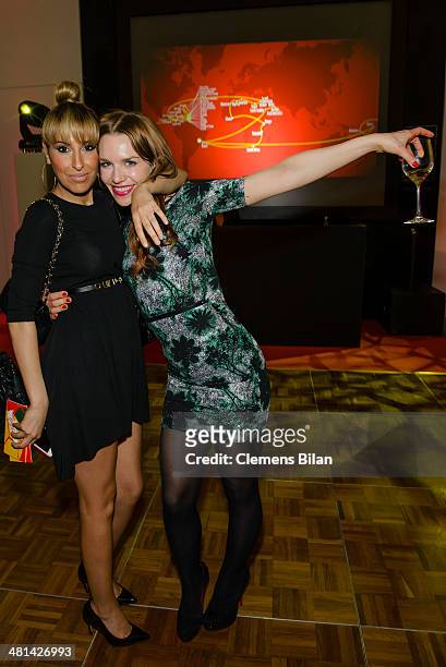 Senna Gammour , and Julia Dietze pose at the Gala Night of the FIFA World Cup Trophy Tour on March 29, 2014 in Berlin, Germany.