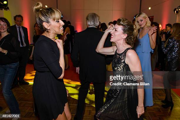 Senna Gaummour and Sanny van Heteren dance at the Gala Night of the FIFA World Cup Trophy Tour on March 29, 2014 in Berlin, Germany.