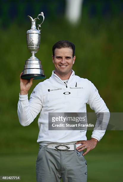 Zach Johnson of the United States holds the Claret Jug after winning the 144th Open Championship at The Old Course during a 4-hole playoff on July...