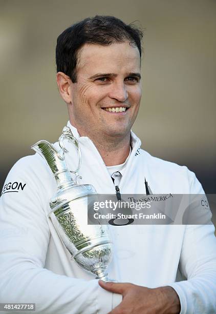 Zach Johnson of the United States holds the Claret Jug after winning the 144th Open Championship at The Old Course during a 4-hole playoff on July...