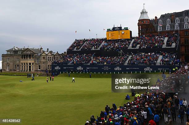 Zach Johnson of the United States celebrates a birdie putt on the 18th green during the final round of the 144th Open Championship at The Old Course...