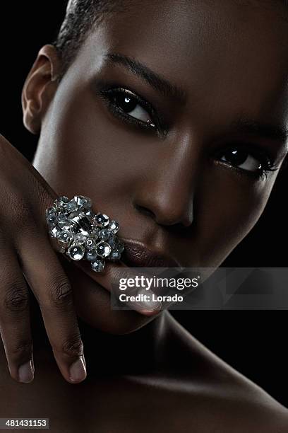 black female model wearing luxury ring - black gemstone stock pictures, royalty-free photos & images