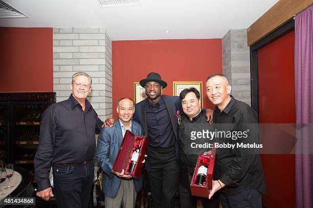 Jayson Pahlmeyer, Li Ning, Dwyane Wade and Nee Lau are seen at private dinner unveiling new Wine Venture with Dwyane Wade and Pahlmeyer Wine on July...