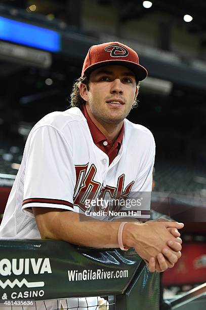 Dansby Swanson of the Arizona Diamondbacks, the first overall pick in the 2015 Major League Baseball draft, watches batting practice prior to a game...