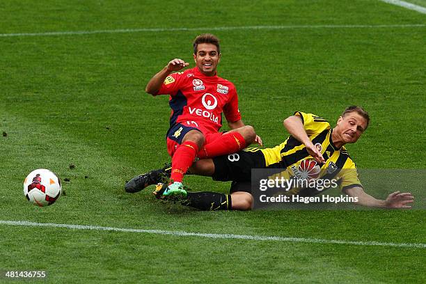 Ben Sigmund of the Phoenix tackles Michael Zullo of Adelaide United during the round 25 A-League match between Wellington Phoenix and Adelaide United...