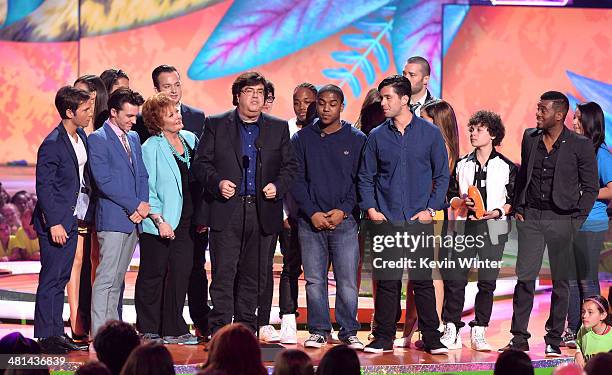 Writer/producer Dan Schneider accepts the Lifetime Achievement Award onstage with actors from his shows during Nickelodeon's 27th Annual Kids' Choice...