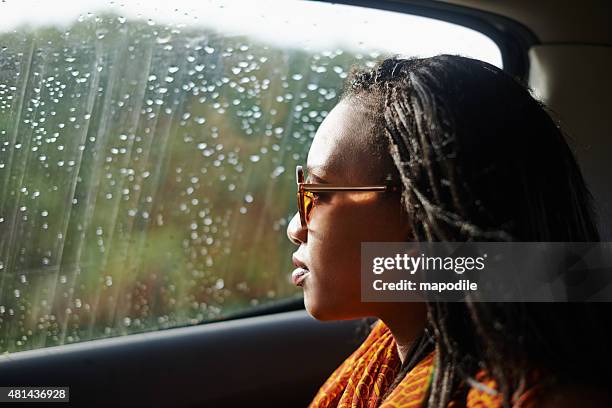 getting away from it all... - looking through sunglasses stock pictures, royalty-free photos & images