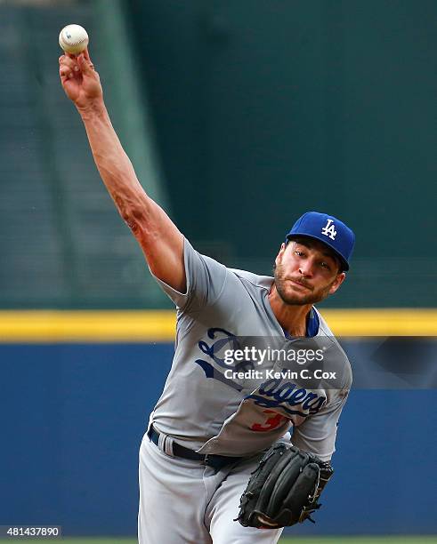 Brandon Beachy of the Los Angeles Dodgers pitches in the first inning against the Atlanta Braves at Turner Field on July 20, 2015 in Atlanta, Georgia.