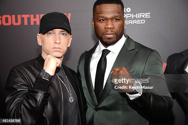 Eminem and 50 Cent attend the "Southpaw" New York premiere at AMC Loews Lincoln Square on July 20, 2015 in New York City.