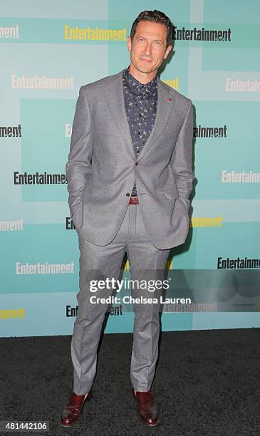 Actor Sasha Roiz arrives at the Entertainment Weekly celebration at Float at Hard Rock Hotel San Diego on July 11, 2015 in San Diego, California.