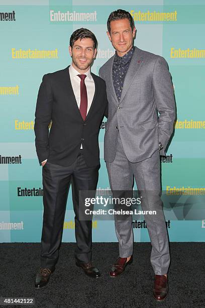Actors David Giuntoli and Sasha Roiz arrive at the Entertainment Weekly celebration at Float at Hard Rock Hotel San Diego on July 11, 2015 in San...