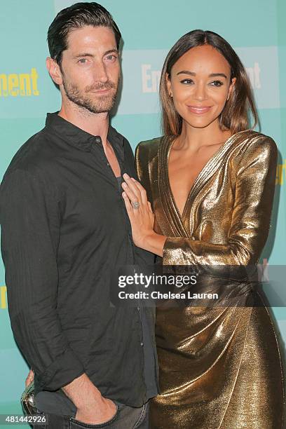 Actors Iddo Goldberg and Ashley Madekwe arrive at the Entertainment Weekly celebration at Float at Hard Rock Hotel San Diego on July 11, 2015 in San...