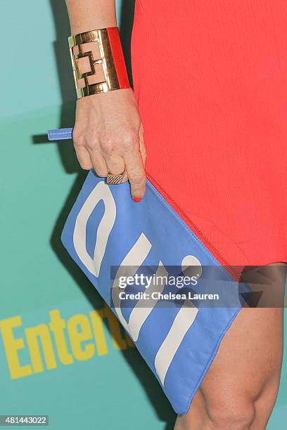 Actress Arden Myrin, clutch and bracelet detail, arrives at the Entertainment Weekly celebration at Float at Hard Rock Hotel San Diego on July 11,...