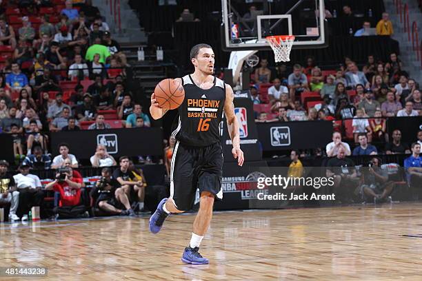 Mike James of the Phoenix Suns brings the ball up court against the San Antonio Spurs during the Las Vegas Summer League Championship on July 20,...