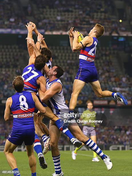 Lachie Hunter of the Bulldogs marks during the round two AFL match between the Western Bulldogs and the North Melbourne Kangaroos at Etihad Stadium...