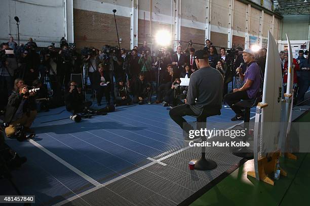 Australian surfers Mick Fanning and Julian Wilson speak to the media during a press conference at All Sorts Sports Factory on July 21, 2015 in...