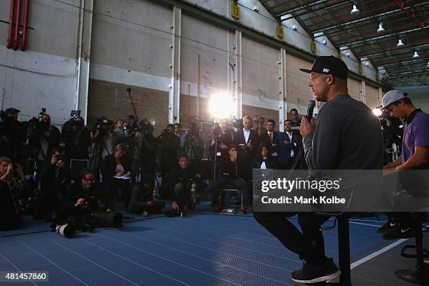 Australian surfers Mick Fanning and Julian Wilson speak to the media during a press conference at All Sorts Sports Factory on July 21, 2015 in...