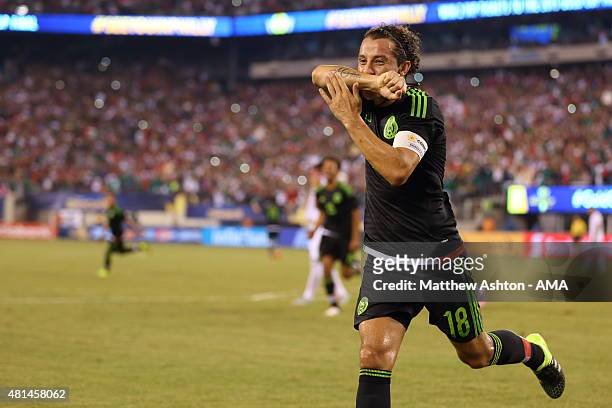 Andres Guardado of Mexico celebrates after scoring a goal to make it 1-0 in the last minute of the game from a controversial penalty kick during the...