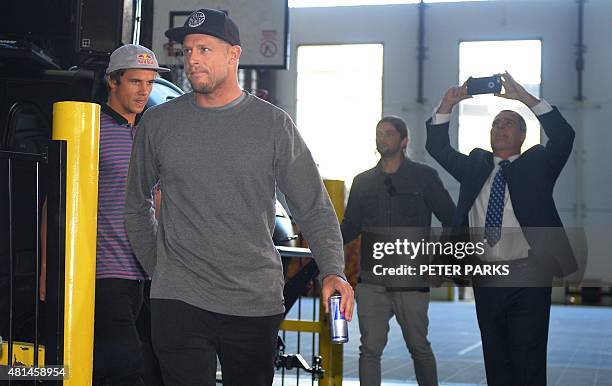 Australian surf champion Mick Fanning and his friend Julian Wilson arrive at a press conference held in Sydney after they flew in from South Africa...