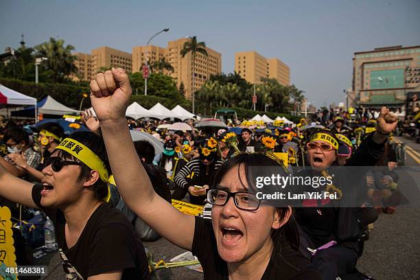 Protesters shout slogans as over two hundred thousand people rally on March 30, 2014 in Taipei, Taiwan. Taiwanese student protesters opposing the...