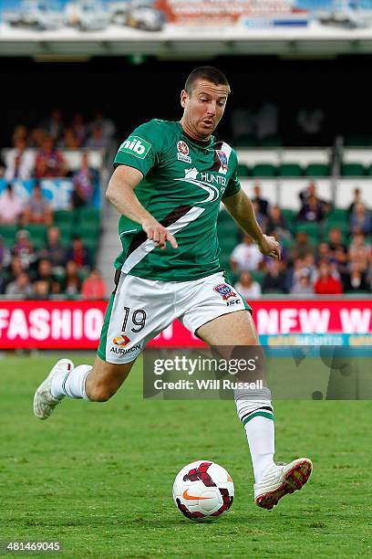 Michael Bridges of the Jets loks to pass the ball during the round 25 A-League match between Perth Glory and the Newcastle Jets at nib Stadium on...