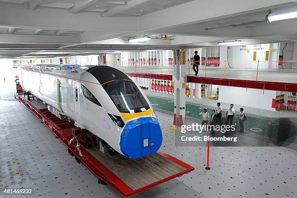 Class 800 Intercity Express train railcar, manufactured by Hitachi Ltd., sits loaded on the Hawaiian Highway roll-on/roll-off transporter ship,...