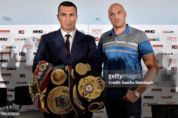 Wladimir Klitschko and Tyson Fury pose during a press conference at Esprit-Arena on July 21, 2015 in Duesseldorf, Germany.