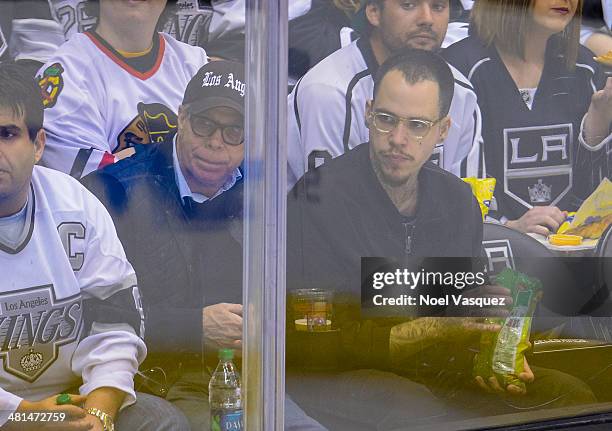 Tommy Hilfiger and Ricky Hil attend a hockey game between the Winnipeg Jets and the Los Angeles Kings at Staples Center on March 29, 2014 in Los...