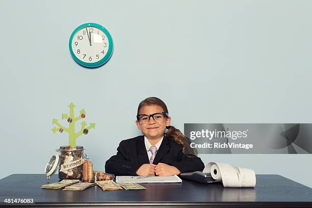 young female accountant in office investing money - hedge fund stock pictures, royalty-free photos & images