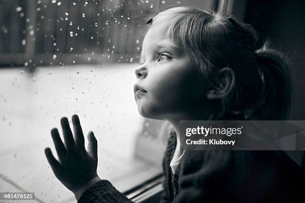 pensive child - girl in shower stock pictures, royalty-free photos & images