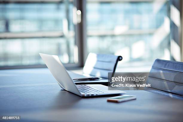 still-life of laptop, phone and notebook with pen - empty table stock pictures, royalty-free photos & images