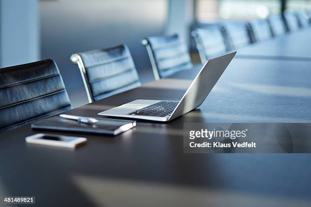 still-life of laptop in stylish conference room - laptop modern schreibblock stock-fotos und bilder