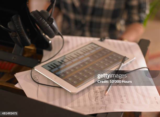 computer tablet on top of a piano with music app - composer stock pictures, royalty-free photos & images