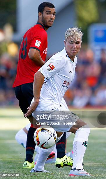 Felix Klaus of Hannover challenges Fofo of Mallorca during the preseason friendly match between Hannover 96 and RCD Mallorca at Wahren-Dorff stadium...