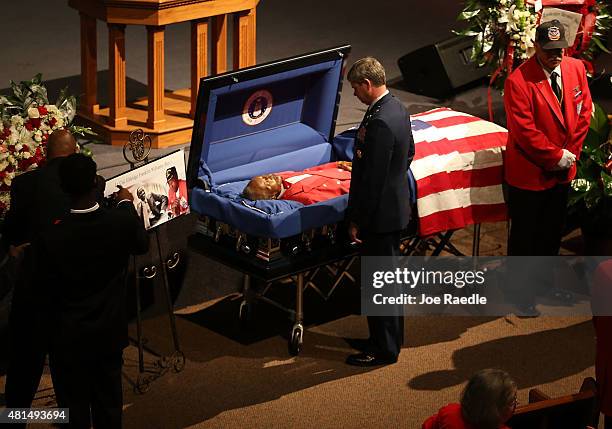 Air Force Major General Michael Plehn pays his respects to retired Air Force Lt. Col. Eldridge Williams during his funeral at the Sweet Home...