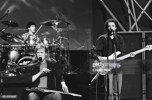 Pictured: Tom Stephen, Jeff Healey, and Joe Rockman of the musical guest The Jeff Healey Band perform on December 20, 1990 --