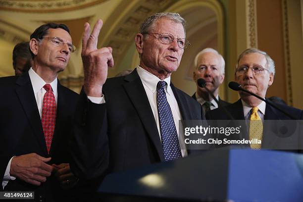 Senate Environment and Public Works Chairman James Inhofe talks with reporters about a proposed highway funding bill after the weekly Senate...