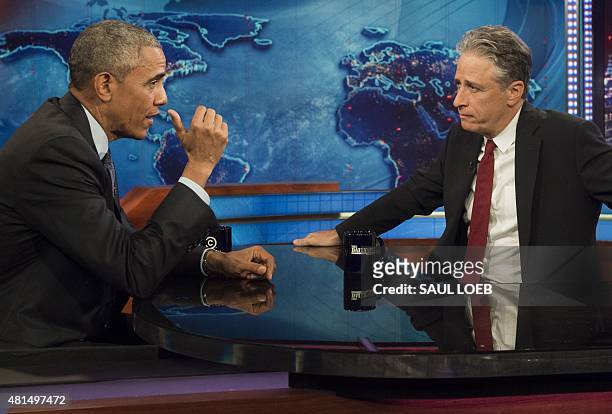 President Barack Obama speaks with Jon Stewart, host of "The Daily Show with Jon Stewart," during a taping of the show in New York, July 21, 2015....