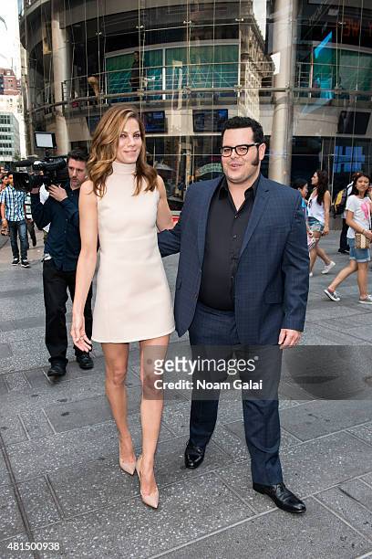 Actors Michelle Monaghan and Josh Gad of Sony Pictures' "Pixels" visit NASDAQ MarketSite on July 21, 2015 in New York City.