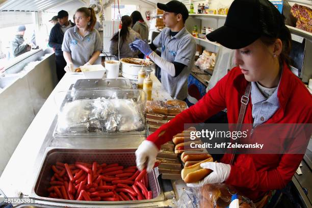 Martinsville Slider hot dogs are prepared in a concession stand prior to the start of the NASCAR Sprint Cup Series STP 500 at Martinsville Speedway...