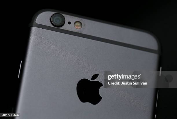 The Apple logo is displayed on an iPhone 6 on July 21, 2015 in San Francisco, California. Apple reported a 38 percent surge in third quarter earnings...