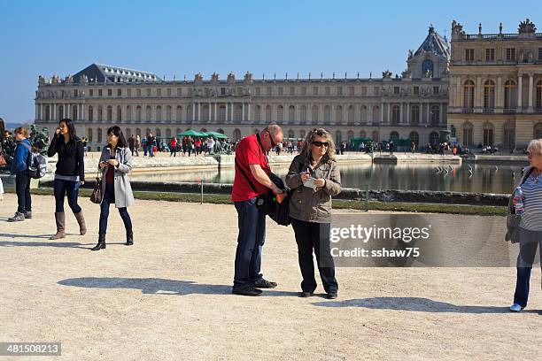 tourists at the palace of versailles - versailles park stock pictures, royalty-free photos & images