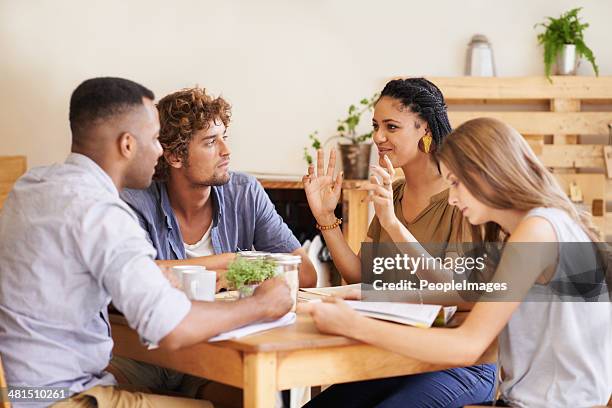 the awesome study group - college students cafe stock pictures, royalty-free photos & images