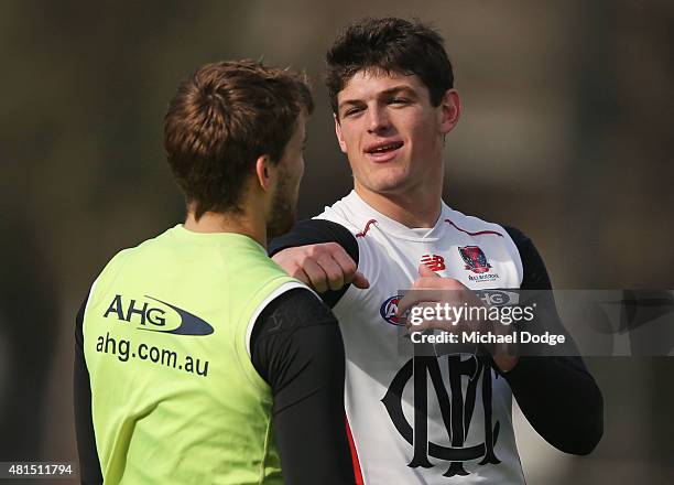 Angus Brayshaw of the Demons throws a mock punch at Jack Viney of the Demons when shadow boxing with each other during a Melbourne Demons AFL...