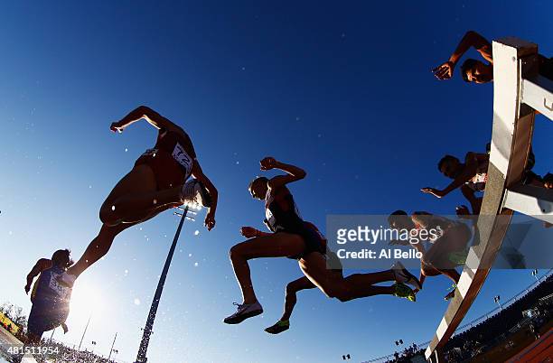General view of competitors leaping over the water jump during the Men's 3000m Steeplechase at the Pan Am Games on July 21, 2015 in Toronto, Canada.